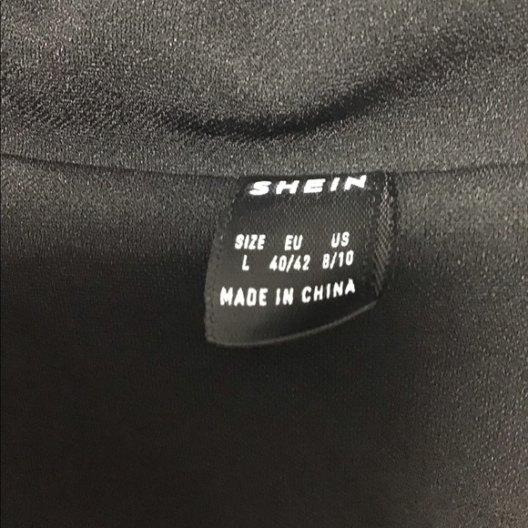 Beautiful black pleated dress… pin not included or the necklace. Size Large - Picture 4 of 4